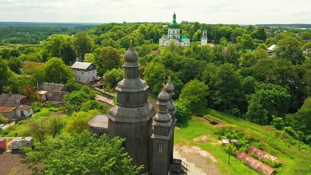 Rural landscape flying around the old wooden church.