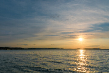Fototapeta na wymiar The colorful sunset over the Minsk sea, Belarus. HDR-photo