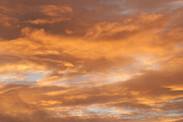 The morning sky was warm, with beautiful orange clouds.