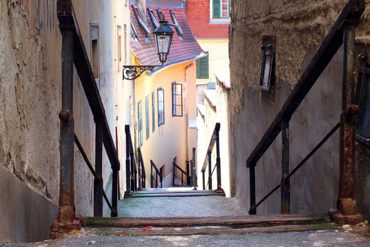 Fototapeta Narrow medieval street with historic architecture in the tourist center of Gornji Grad - old Upper town of Zagreb, Croatia