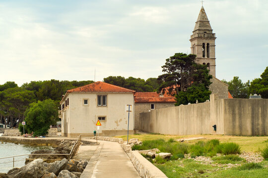 Old town of Osor and beautiful Adriatic sea coast on a cloudy day on Croatia islands Cres and Losinj