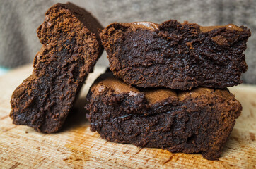 Three pieces of brownie chocolate cake close-up. Homemade baking.