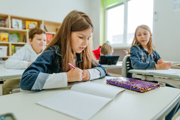 Elementary school students learning in the classroom