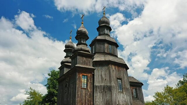 Rural landscape flying around the old wooden church.