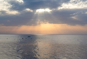sunset at sea. variety of colors and hues of the rising sun. Sea landscape.