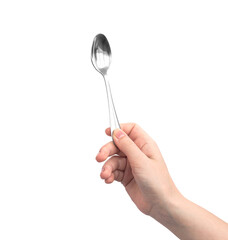 Steel shiny spoon in hand, isolated on a white background photo