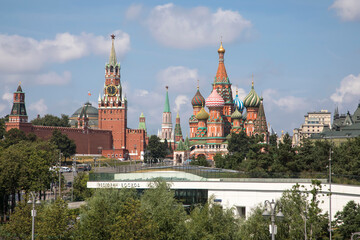 Obraz premium Beautiful Moscow Kremlin on the river bank. High towers. Sunny day. Ancient architecture. Center of Moscow.