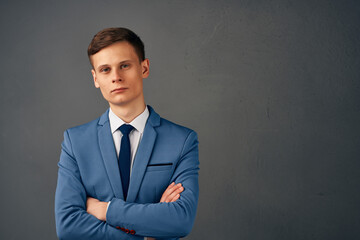 portrait of business man in suit posing studio isolated background