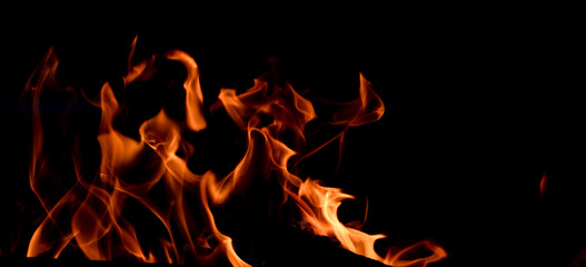 The fire. Flames. Banner, abstract background, wallpaper. Yellow and orange flames.