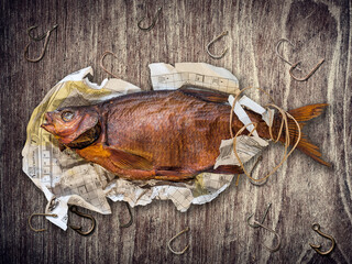 the fish is delicious smoked big in the newspaper caught in the river