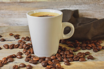 Coffee beans on wooden Close Up 