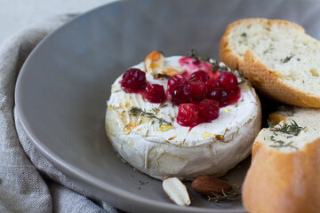 Cheese camembert with honey and almond 