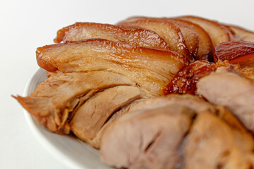 cooked pork feet on a white background