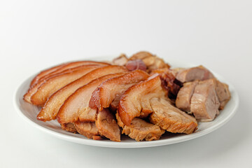 cooked pork feet on a white background