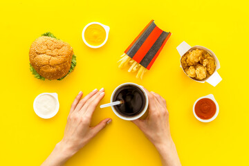 Fried chicken nuggets and burger potatoes with sauce
