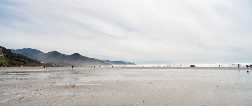 Panoramic View On Cannon Beach In Oregon Usa With People Walking, Beach Panorama