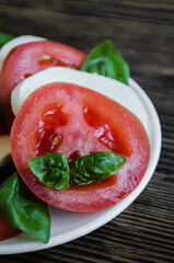 Italian salad with mozzarella cheese and tomato