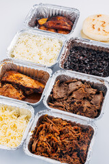 Top view of various ingredients used to fill arepas, a typical South American dish. Venezuelan and Colombian food