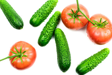 Fresh tomatoes and cucumbers, vegetables on a white background