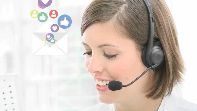Animation of envelope with digital icons over businesswoman wearing headset