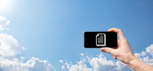 Male hand holding a document icon on blue background. Document Management Data System Business...