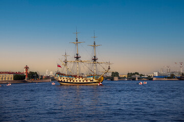 Fototapeta na wymiar Frigate Poltava at sunset in St. Petersburg