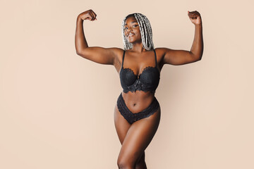 body positive female afro-american woman with an authentic figure