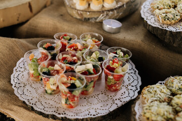 snack bar tartlets bread sliced tomatoes vegetables canapes cheese portions