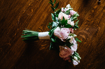 Beautiful bouquet flower on wooden table. Flat lay wedding bouquet. Love concept.
