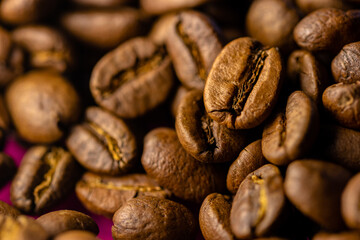 Many roasted coffee beans close up