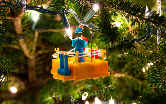 Rock 'Em Sock 'Em Robots Christmas Tree Ornament Hanging On A Tree