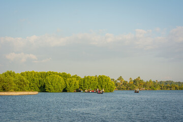 Canoe trip through Astamudi Lake, Munroe Island