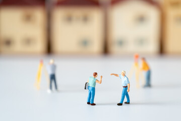Miniature Inspector or Engineer Worker Labor is checking House building structure and Home Working...