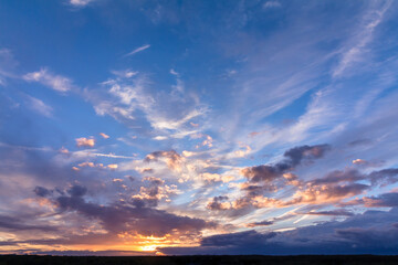 Colorful sunset with clouds in the evening
