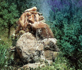 rock fountain in the garden