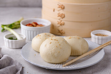 Chinese steamed buns baozi with steamer