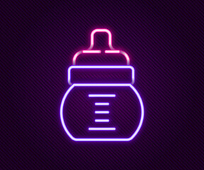 Glowing neon line Baby bottle icon isolated on black background. Feeding bottle icon. Milk bottle sign. Colorful outline concept. Vector