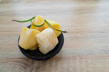 tapai or tape or peuyeum are traditional foods  snacks from indonesia, made from fermented cassava. selective focus