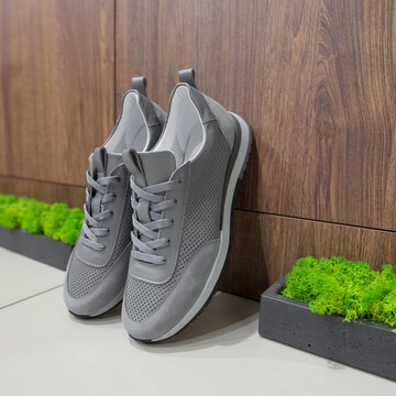 A New Grey Sneakers In The Shoes Store
