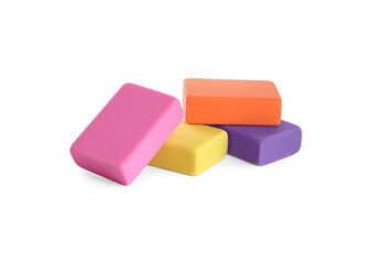 Obraz premium Pile of bright erasers on white background