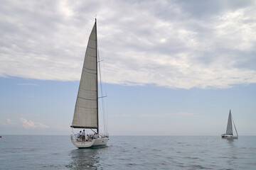 Naklejka na ściany i meble sailing yacht regatta. Sailing yachts are competing. Cruising sailing yachts.