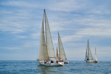 Fototapeta na wymiar sailing yacht regatta. Sailing yachts are competing. Cruising sailing yachts.