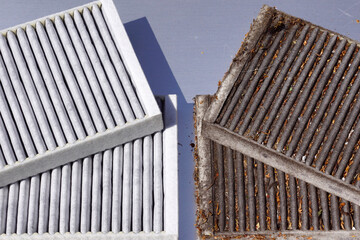 Comparison of two car cabin filters. Clean filter and used filter to be replaced.
