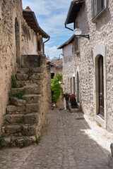 girl walking in the medieval town of santo stefano di sessanio abruzzo