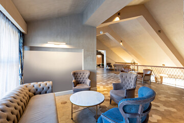 Interior of a loby cafe in the modern attic hotel