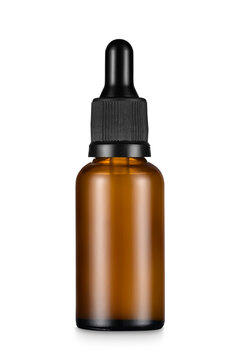 Empty amber glass bottle with black rubber dropper without label on white background