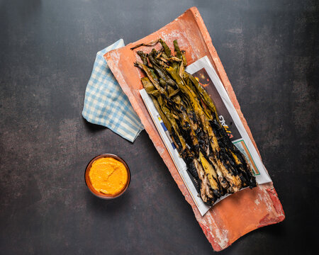 Grilled spring onions with romesco sauce. Spanish cuisine