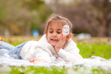 happy girl with soap bubbles