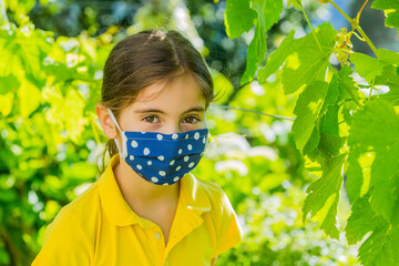 Little girl with mask