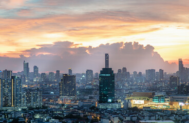 Bangkok, Thailand - Jun 02, 2021: Aerial view of Beautiful scenery view of Skyscraper Evening time Sunset creates relaxing feeling for the rest of the day. Selective focus.